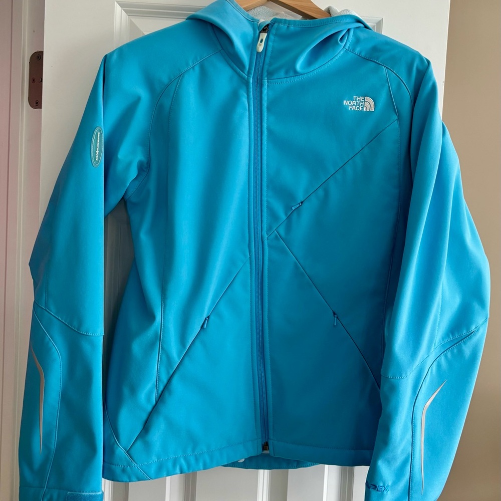 North Face women’s size L windproof hooded jacket in vibrant turquoise